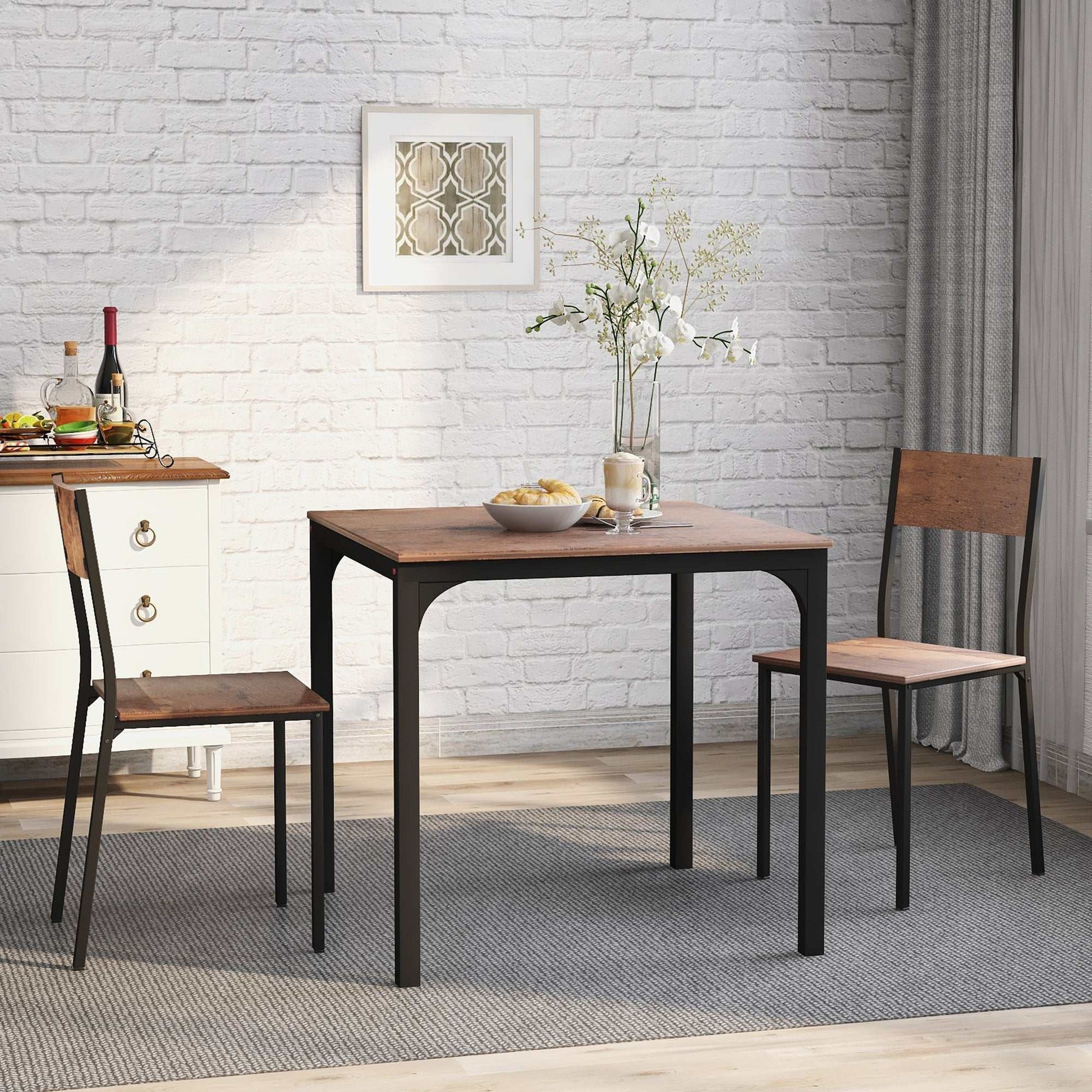 Vintage brown dining table set with two chairs and metal frame in compact design
