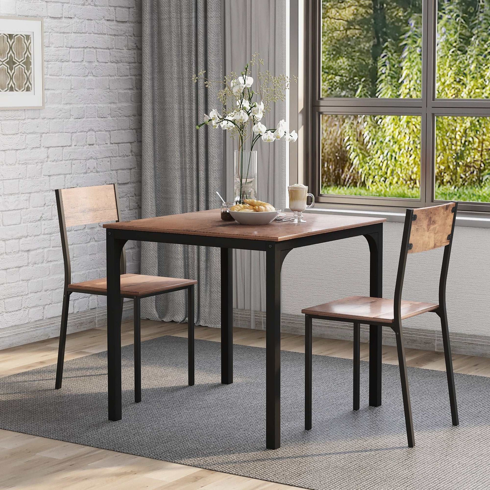 Vintage brown dining table set with two chairs and sturdy metal frame in warm finish