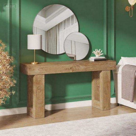 Long farmhouse-style console table with wood finish and decorative decor in living room
