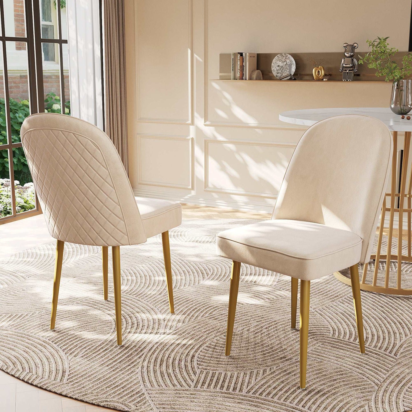 Set of six beige velvet dining chairs with gold metal legs in modern dining room setting